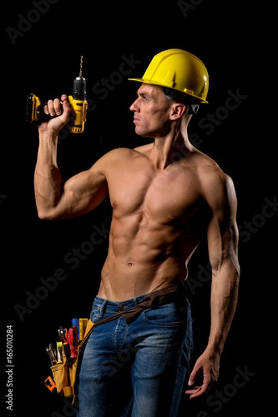 Obraz fit shirtless worker with tools