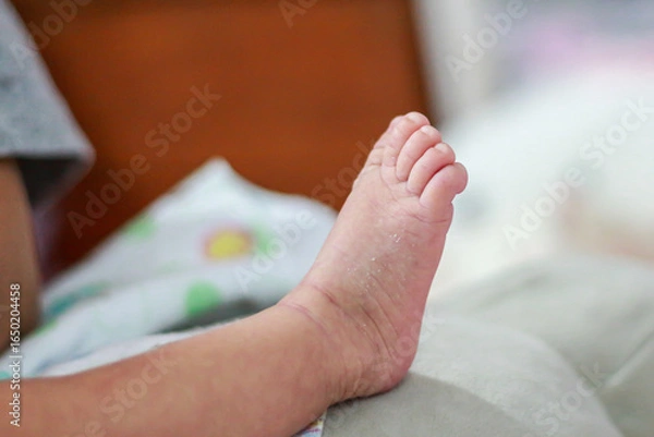 Obraz Foots of infant during sleep looking cute and cuddly.