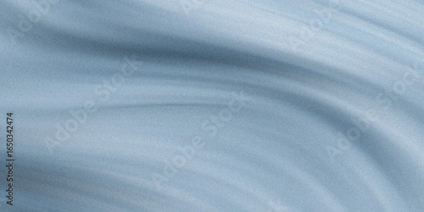 Fototapeta A gentle blue textured background with subtle waves creates a calming and abstract visual effect with its smooth design