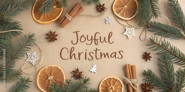 Obraz This image shows a Christmas scene with the words Joyful Christmas. The spices, evergreens, and stars add a festive touch, conveying warmth and cheer.