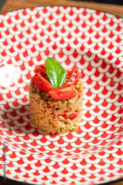 Fototapeta tuna tartare with spelt and tomatoes