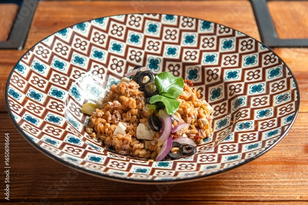 Fototapeta Fresh Mediterranean Greek Farro Salad with Olives, Tomatoes, Carrots, Feta Cheese and Farro, Asparagus and Artichokes