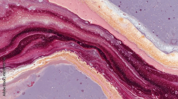 Fototapeta Pink and purple mineral or gemstone with layered, flowing textures and sparkling accents