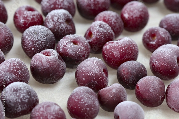 Obraz Frozen cherries on white background