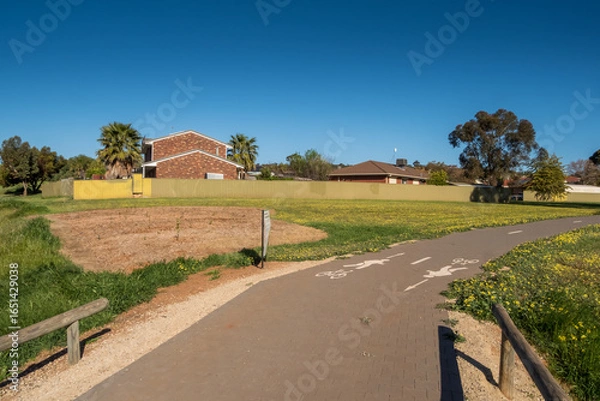 Fototapeta vibrant photos of Playford's landscape transformation. Showcase grant-funded revegetation, mass plantings, and biodiversity at Craigmore Park. Capture spring meadows, young forests