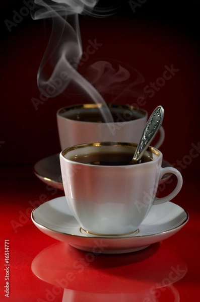 Obraz Two cups of coffee on a red-black background