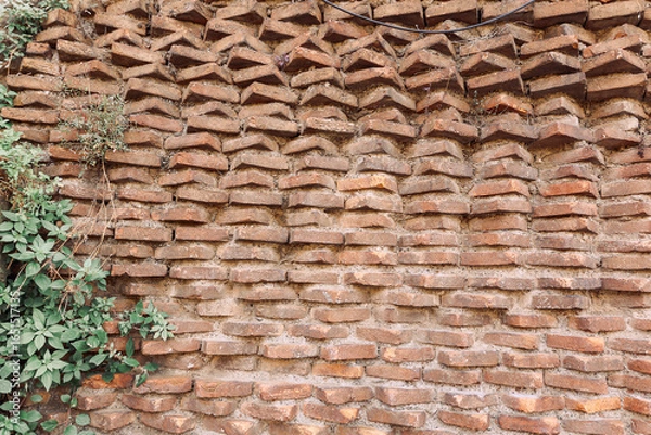 Obraz Wall of old red bricks with unusual masonry in Rome, Italy. High quality photo