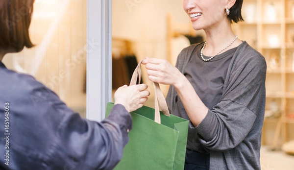 Obraz アパレルショップで働く日本人女性