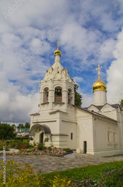 Fototapeta Sergiev Passad, Territory adjacent to the Temple of St. Sergius of Radonezh. Chapel, Temple of Paschvoi Friday. Summer, Russia. Landscape.