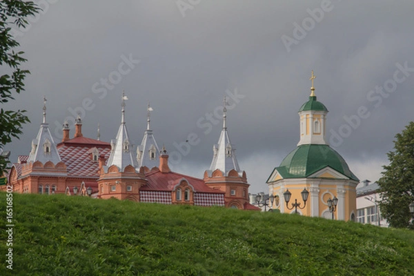 Obraz Sergiev Passad, Territory adjacent to the Temple of St. Sergius of Radonezh. The cupolas of the cathedral, an ancient fortress. Summer, Russia.
