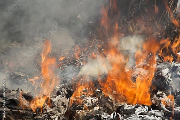 Fototapeta Burning garbage dump