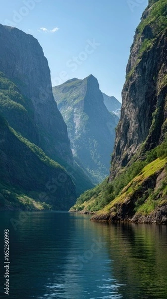 Fototapeta Scenic fjord view with mountains and calm waters