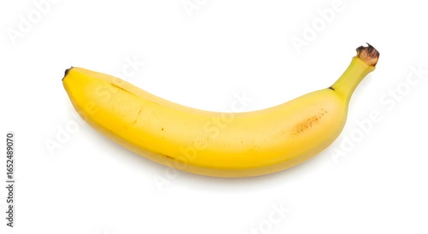 Fototapeta Single Ripe Yellow Banana A Nutritious Fruit Isolated on White for Healthy Eating