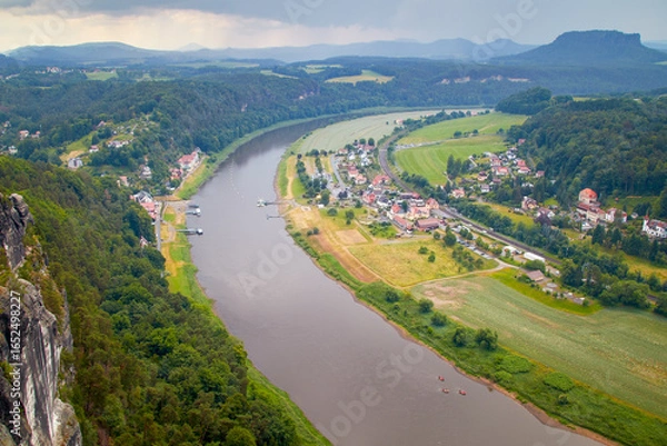 Fototapeta View of the hiking village of Rathen in Saxon Switzerland from the viewpoint called Bastei