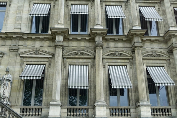 Fototapeta Old Windows with Striped Binds in Paris
