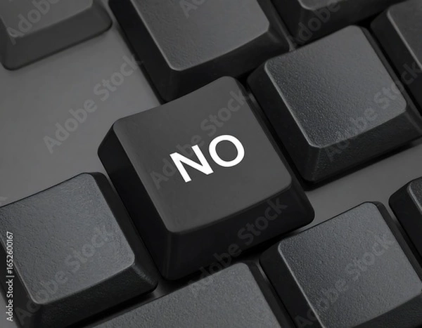 Fototapeta Black computer keyboard with a single highlighted key displaying the word NO in white text
