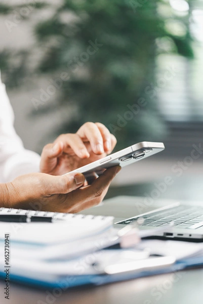 Fototapeta Finance bank tax expense accounting budget money businessman hand use calculator Financial calculate accountant close up calculator with graph chart write office desk Business expense analysis saving