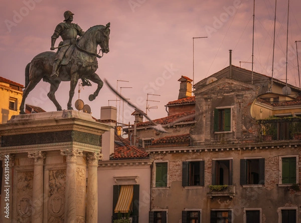 Fototapeta Bronze equestrian statue of Venetian commander at sunset