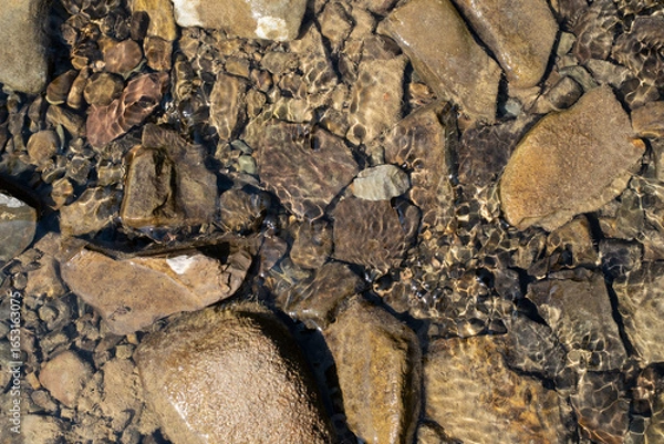 Fototapeta Group of stones close-up. Background of building material, decorative stone.