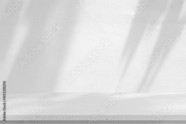 Fototapeta close up mockup studio with shadowing  and light of white plain concrete wall texture and tabletop  for show product on display background concept