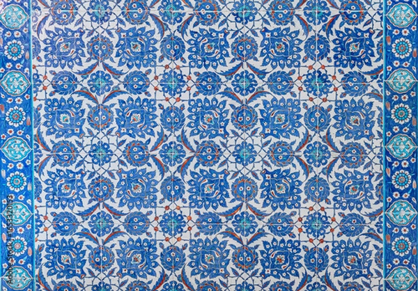 Fototapeta Vintage ceramic tiles, İznik tiling decor from Rustem Pasa Mosque in Istanbul, Turkey.