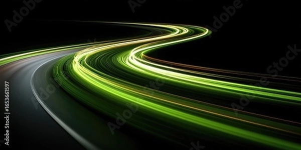 Fototapeta Abstract light trails curve across dark background