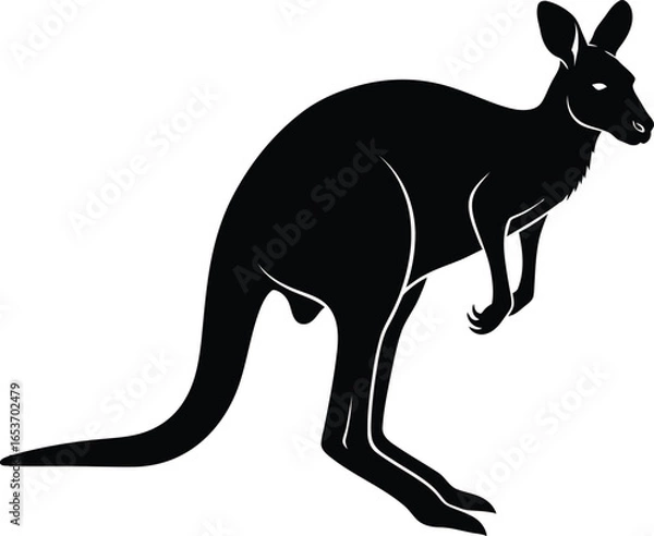 Fototapeta A black silhouette of a kangaroo standing on its hind legs with its tail extended.