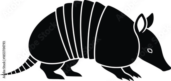 Fototapeta A black silhouette illustration of an armadillo with its segmented shell and tail, depicted in profile.
