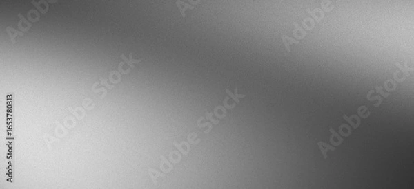 Fototapeta Abstract grey gradient background featuring grainy noise texture, soft glowing gray wallpaper for modern design