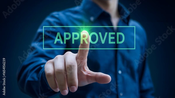 Fototapeta Man pressing the "Approved" button for success, validation, and acceptance