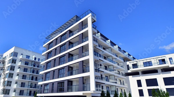 Obraz Modern new residential apartment house building complex. Exterior view of modern apartment building. New construction apartment or condo complex.