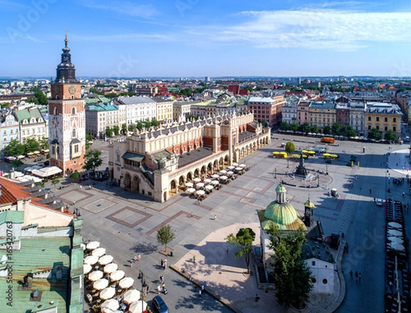 Fototapeta Main Market Square (Rynek), old cloth hall (Sukiennice), town hall tower, Church of St. Adalbert or St. Wojciech and renovated Mickiewicz statue in Krakow (Cracow) Poland. Aerial view