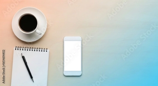 Fototapeta Desk Scene with Coffee Cup, Notepad, Pen, and Smartphone on Light Background for Creative Work and Productivity Inspiration