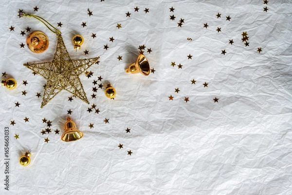 Fototapeta Gold Christmas theme decoration on paper texture background, gold star, star glitter, Christmas bell.
