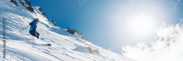 Obraz Skier on Sunny Slope with Copy Space Wide Banner