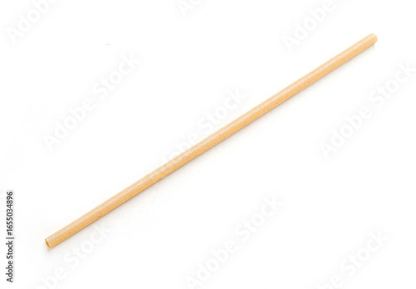 Fototapeta Single biodegradable drinking straw lying on white background