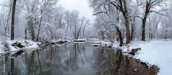 Obraz Winter wonderland, snow-covered trees and a serene river