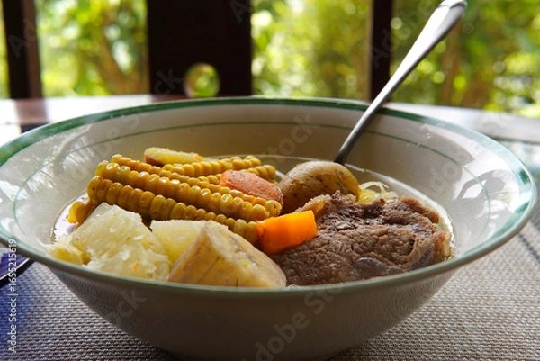 Fototapeta Close-up of a typical Costa Rican soup called Olla de Carne, a typical Costa Rican dish with white rice, chayote potatoes, carrots, and green plantains. Beef soup with vegetables,mexican soup