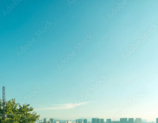 Obraz 淡い青空と遠景の街並み