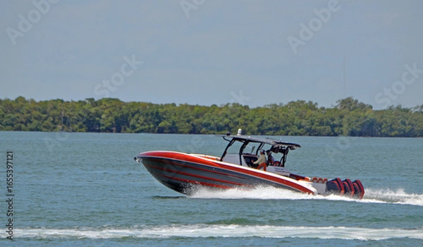 Fototapeta Hi-End Motor Boat Powered by Three Outboard Engines