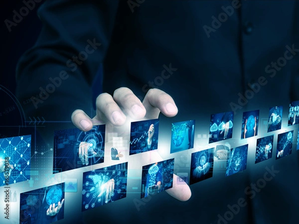 Obraz businessman holding technology