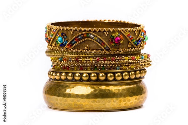 Obraz stack of golden bracelets