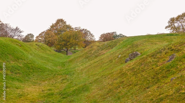 Fototapeta Ditch fortification at site of Roman fort Rough Castle in Central Scotland on the Antonine Wall