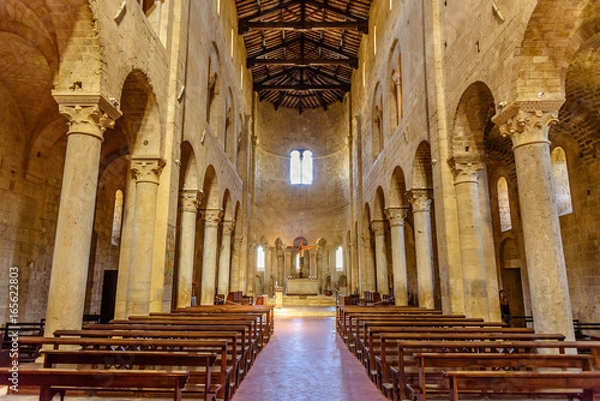 Fototapeta The central nave of the ancient Romanesque church of Sant'Antimo near Montalcino in Tuscany