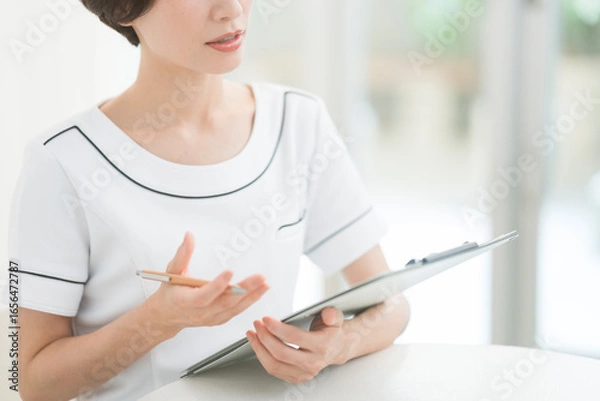 Obraz エステティシャン/セラピスト/彼女はカウンセリングをしている