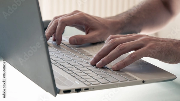 Obraz typing on laptop