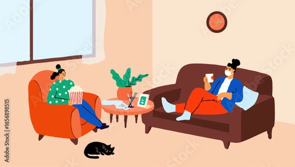 Fototapeta Two people relaxing at home watching a movie with popcorn and drinks