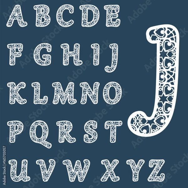 Fototapeta Templates for cutting out letters. Full English alphabet.  May be used for laser cutting. Fancy lace letters. Font isolated blue background. Vector.