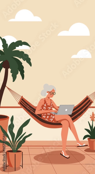 Fototapeta Relaxed senior woman working on laptop in a hammock on a tropical patio, enjoying remote work and leisure during retirement travel.