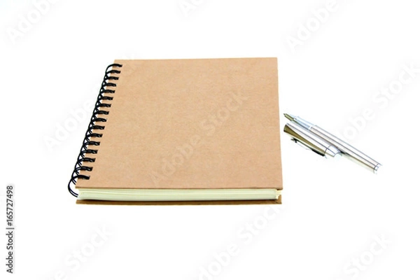 Fototapeta Notebook and pen on a white background